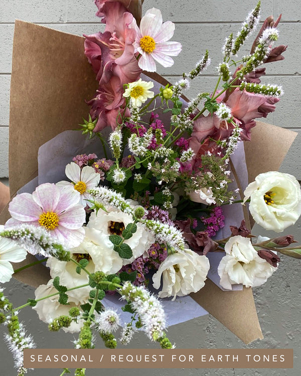 Classic bouquet in earthy seasonal tones featuring cosmos, lisianthus, mint, gladiolus, and soft textural greens.