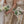 Soft pastel posy bouquets designed for an intimate wedding, featuring delicate seasonal flowers in a loose arrangement.