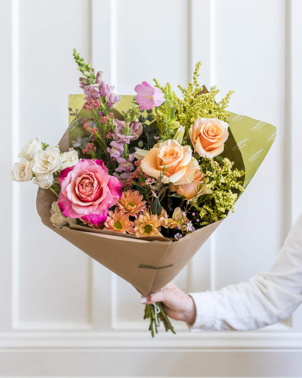 Luxe bouquet in a florist's choice palette with garden roses, snapdragons, mums, and seasonal flowers, designed by Landfall Floral Co.