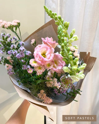Signature Bouquet in blush, lavender and white with airy movement and unique flowers.